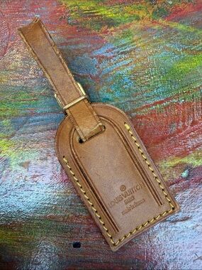Louis Vuitton small size leather name tag bag brown gold tone metal buckle LV